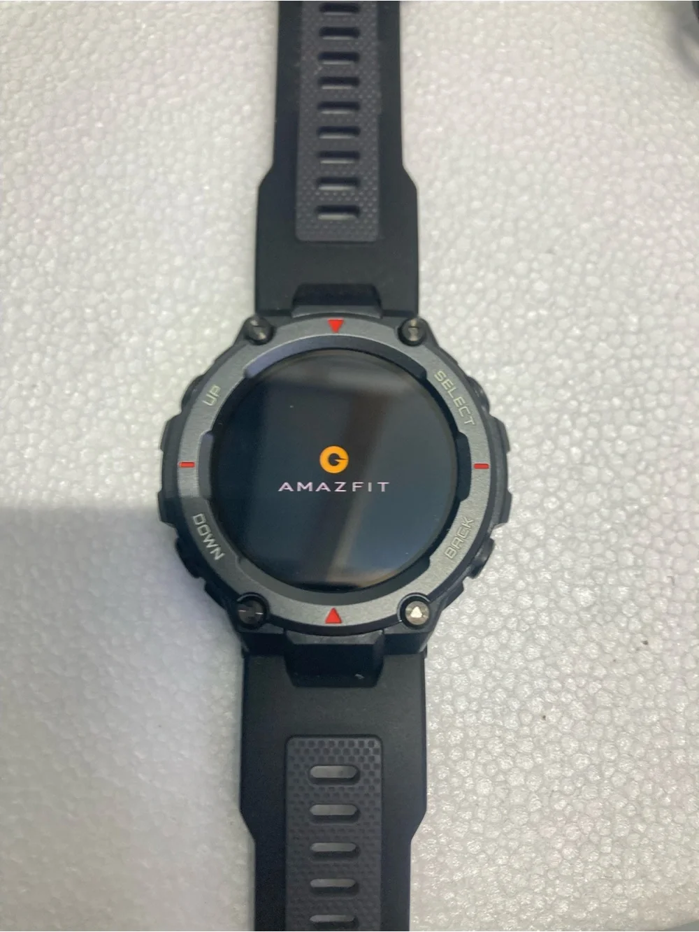 Rugged Black Smartwatch with Pink-Accented Dial